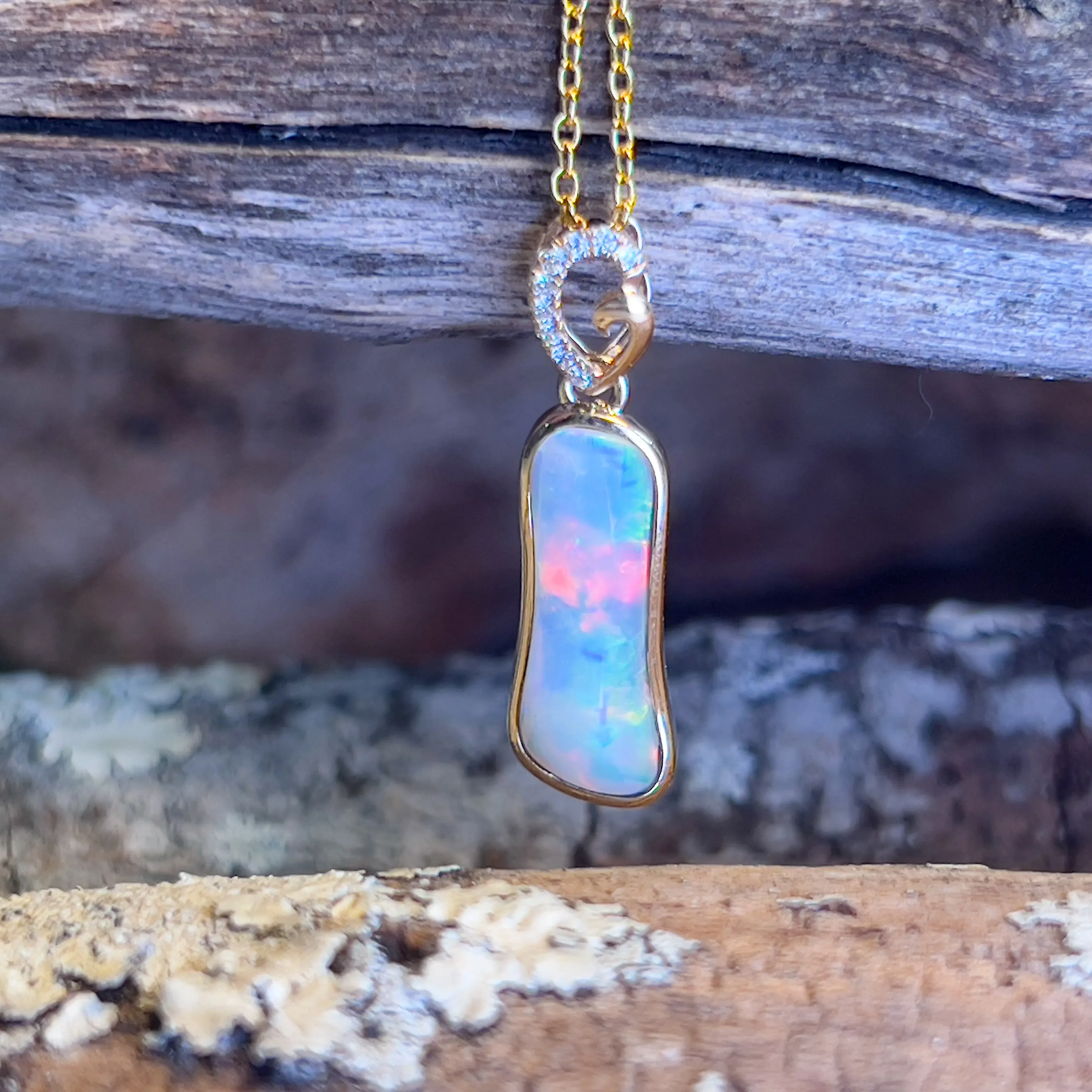 14kt Yellow Gold freeform Crystal Opal 1.05ct and diamond pendant