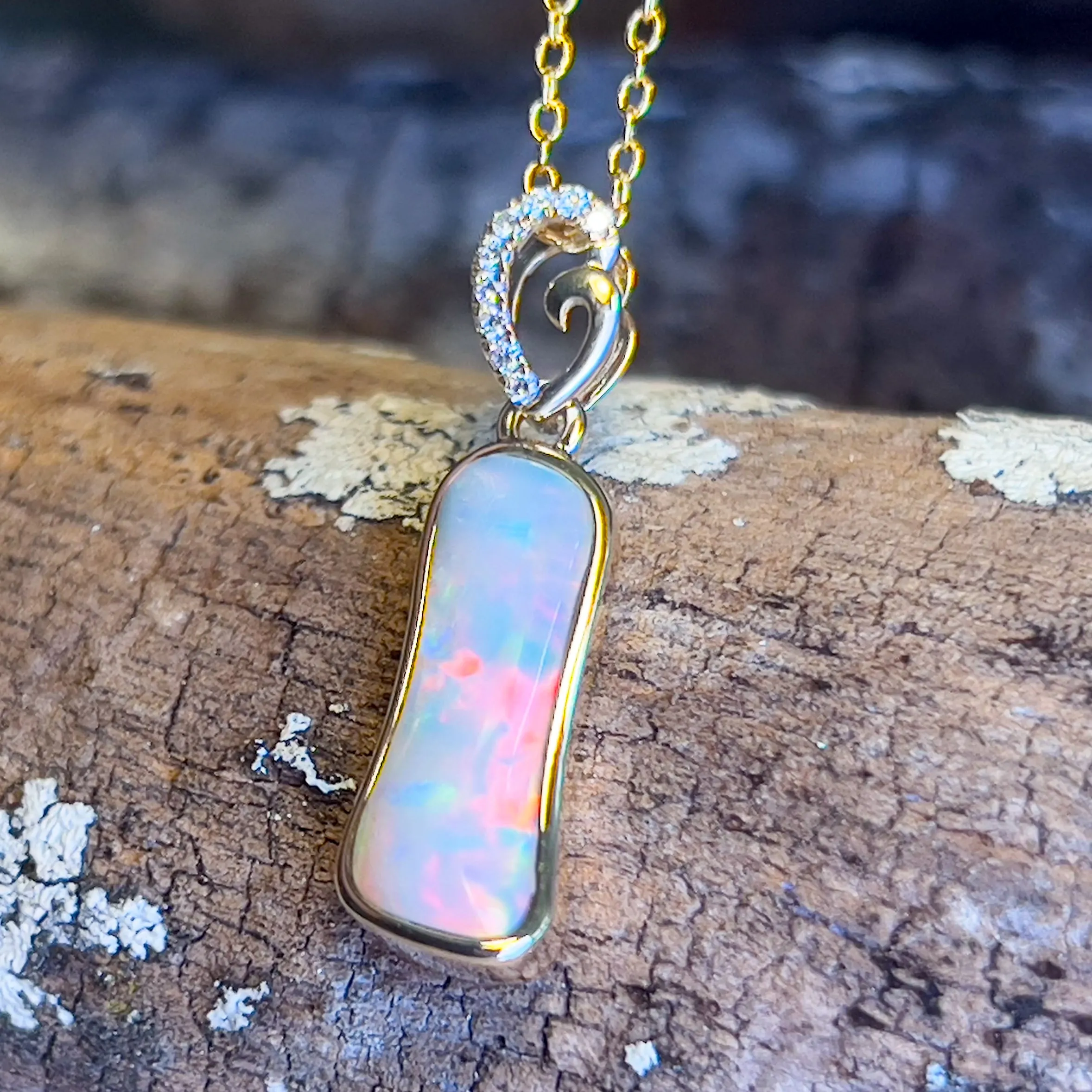 14kt Yellow Gold freeform Crystal Opal 1.05ct and diamond pendant