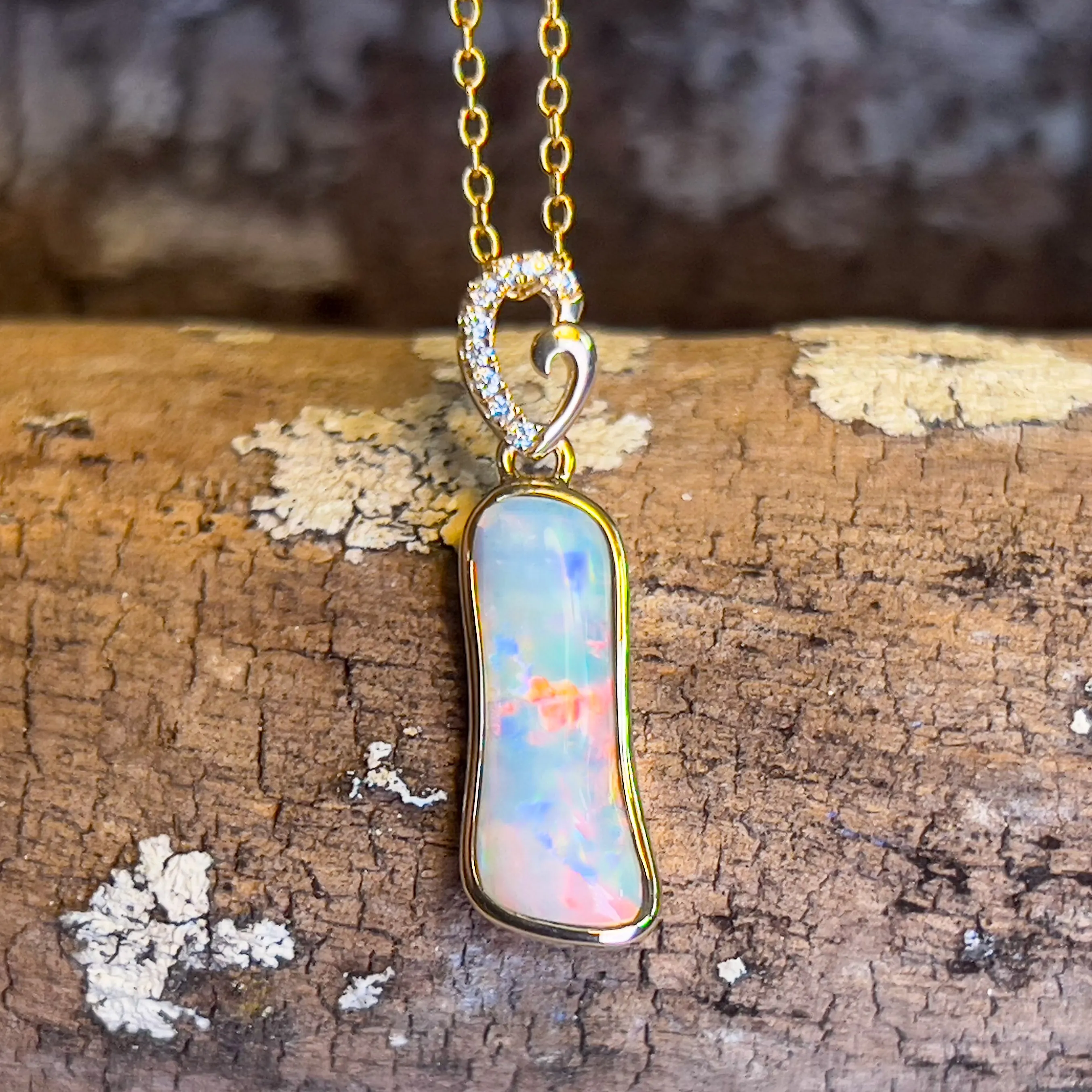 14kt Yellow Gold freeform Crystal Opal 1.05ct and diamond pendant