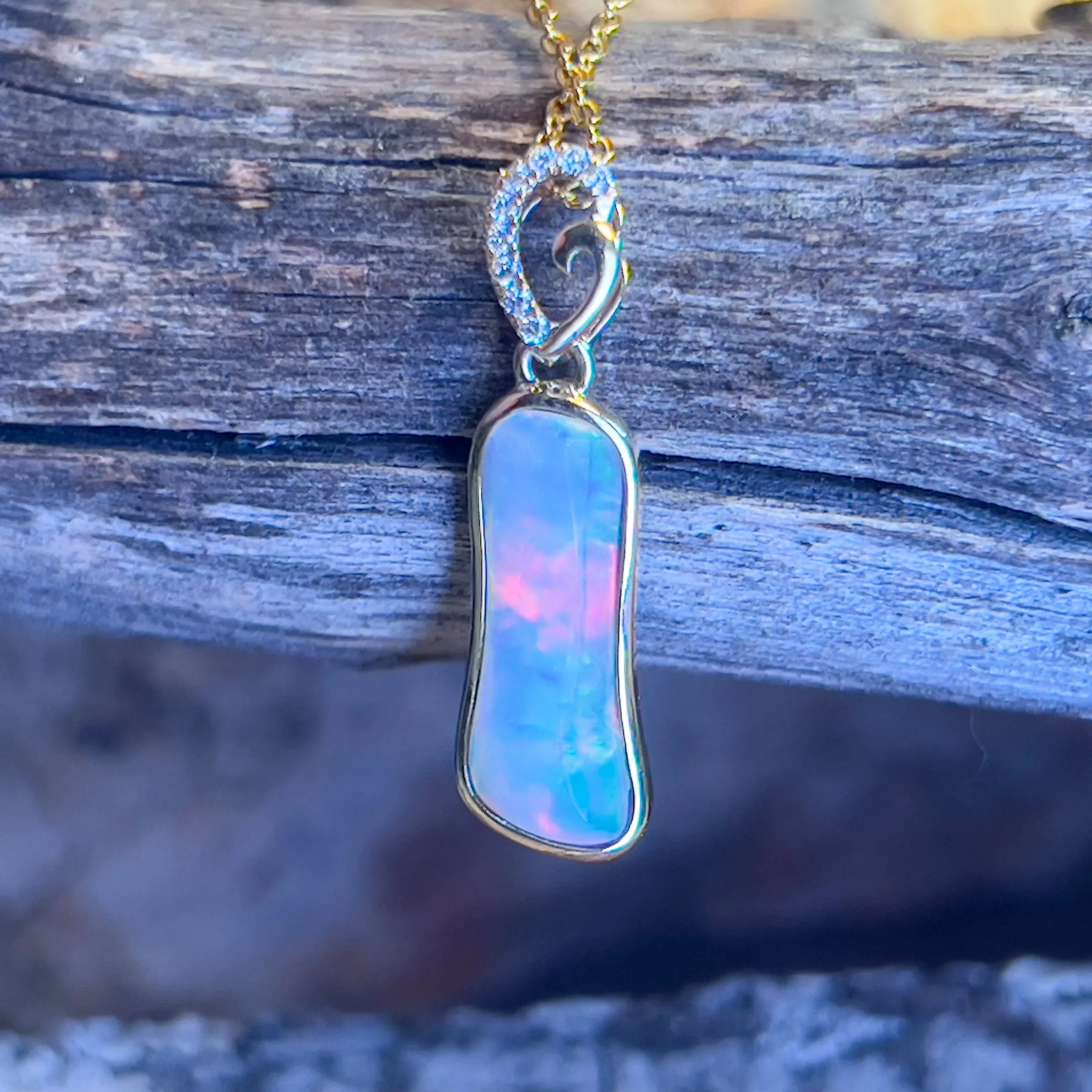 14kt Yellow Gold freeform Crystal Opal 1.05ct and diamond pendant